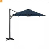 Dark navy fabric canopy on a black metal cantilever patio umbrella stand