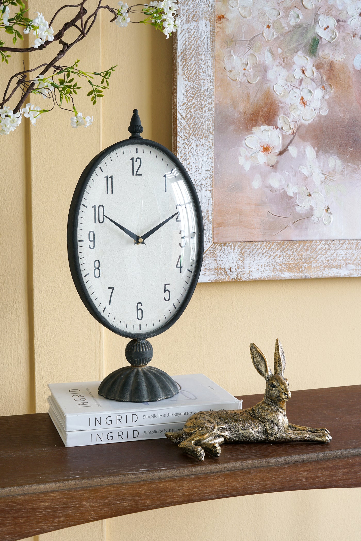 Vintage Black Oval Table Clock with White Face Pedestal Base